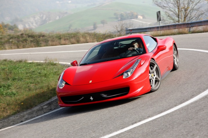 Ferrari points to the number of awards its 458 Italia has won as a testament to the stellar nature of its track-ready sports car. Entering its third year on the market in 2012, the 458 Italia has already received more than 30 awards from around the globe. Motor Trend picked the 458 Italia from 10 other entrants as its Best Driver’s Car for 2011, specifically commending the 458 Italia for the “fine quality of its actions” and the “satisfaction it gives to its pilot.” Auto Express tested 30 performance cars and was able to extract its best track time ever in the 458 Italia, even besting the new McLaren MP4-12C to take home its award for Performance Car of the Year for the second year in a row.  These recent awards sit on the mantle next to other accolades for the 458 Italia since its launch in 2009 as a 2010 model. It has been CAR’s Performance Car of the Year, the Daily Telegraph’s Car of the Year, Fifth Gear’s Fast Car of the Year, and Top Gear’s Supercar of the Year and Car of the Year. Even parts of the 458 Italia have been recognized: in 2011, the International Engine of the Year Awards declared the naturally aspirated 4.5-liter V-8 in Ferrari 458 Italia the Best Performance Engine.  Since its inception as a successor to the beloved F430, the Italia has had one recall and a minor software upgrade. The sublime F430 is a tough act to follow, but Ferrari was so confident of its successor right from the beginning that it patriotically attached the name of the mother country, Italia, to the nameplate. Of course, the fact that a German, Michael Schumacher, played a key role in its development and, ultimately, how it drives, only enhances its credibility since he is also a seven-time world driving champion and a primary reason for the Italian automaker’s recent Formula One success