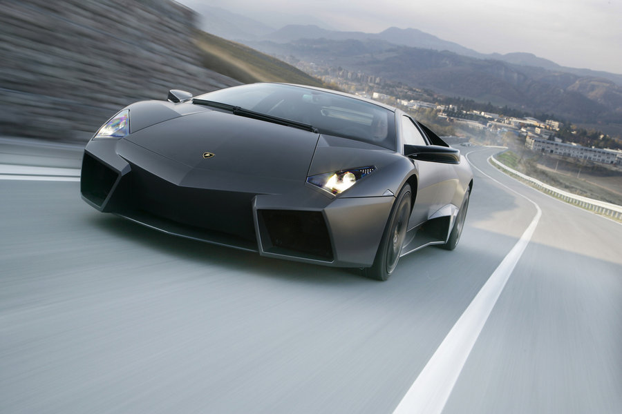 Background: Lamborghini newest supercar, the Reventon, was finally unveiled to a waiting public at the Frankfurt Auto show. So for approximately $1.5-million dollars you would expect to get the newest Enzo-beater and Veyron fighter, right? Not so with the newest Lambo. The extra $700,000 over the cost of a Murcielago LP640 will net 10 extra horsepower! That’s an extra $70,000 per horsepower.  Exterior: Like most car companies nowadays, Lamborghini is pushing that its inspiration for this car was a supersonic jet, in this case an F-22 Raptor. The Reventon has looks that quite simply take your breath away; the styling of this car screams a cross between a transformer and an F-117 Stealth Fighter. It still looks very similar to the last Murcielago, just with sharper edges, larger scoops, rims that look like they could dice fruit, and two large tail lamps that are large enough to be hidden jet thrusters.  Performance: Since the Reventon engine, transmission, suspension, drive train, etc. are simply based off the Murcielago LP640, expect them to perform very similar to one another. The zero-to-60 time should be close to 3.4 seconds. 